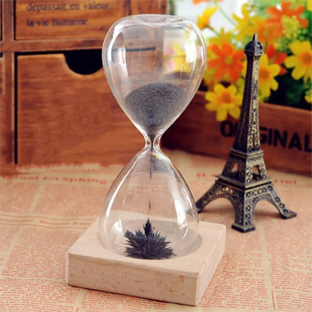 Magnetic Sand Hourglass Sculpture - Wood Base finish, lifestyle shot
